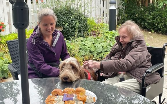 Caring Resident at Horsell Lodge in Surrey With Furry Paws and Sweet Treats