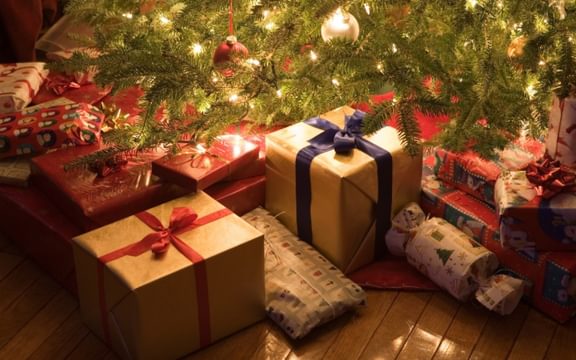 Christmas presents underneath the Christmas Tree at Caring Homes