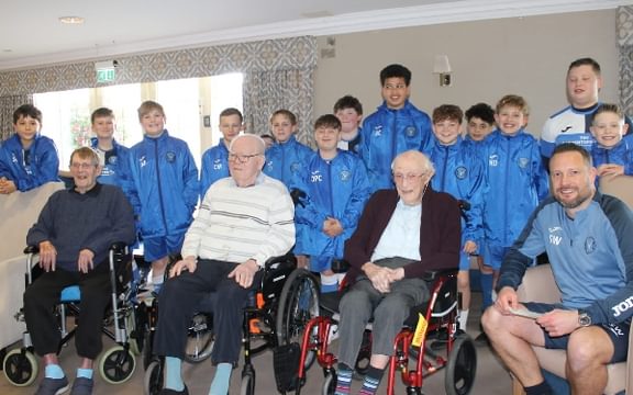 Homefield Grange Care Home in Christchurch residents spending time with local football team, Bransgore