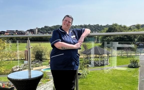 Lisa Newman in viewing balcony at The Manor Care Home in Edinburgh