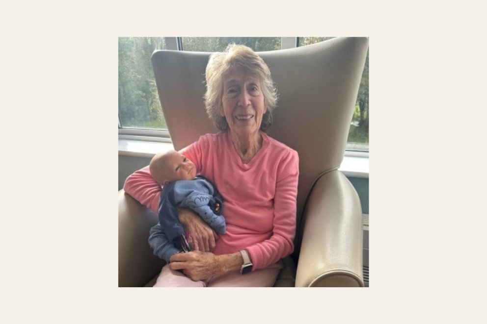 Mellish House Care Home resident caring for therapy doll