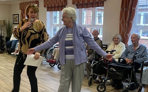 Parris Lawn in Lewes resident dancing at fashion show