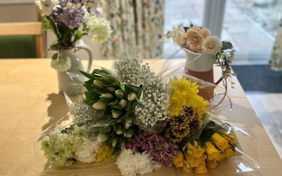 Flower arrangements by residents at Broadbridge Park