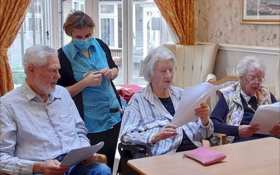 Residents at The Pines enjoying their first choir practice