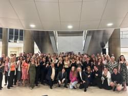 Group photograph of the CBSO Chorus celebrating after a concert in Monaco.
