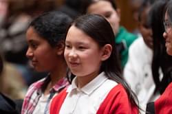 Photograph of a child rehearsing in the Children's Chorus.