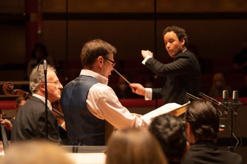 Photograph of Raphael Wallfisch and Simon Keenleyside performing with Gergely Madaras and the CBSO at Symphony Hall.