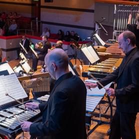 Photograph of Toby Kearney and other percussionists performing at Symphony Hall
