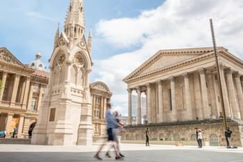 Exterior of Birmingham Town Hall with people walking