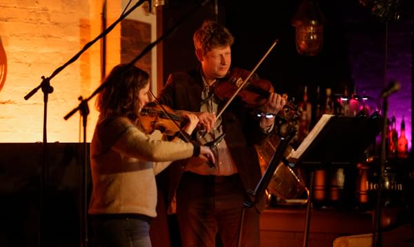 Photograph of Adam Romer playing the viola at Hockley Social Club