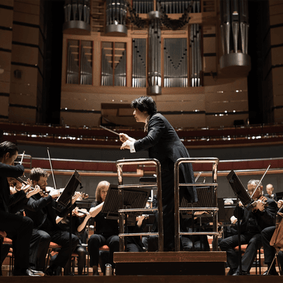 Photograph of Kazuki Yamada conducting the CBSO at Symphony Hall.