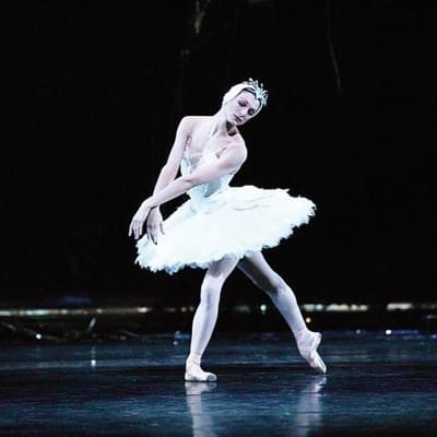 Photograph of ballerina Zenaida Yanowsky dancing in a white tutu.