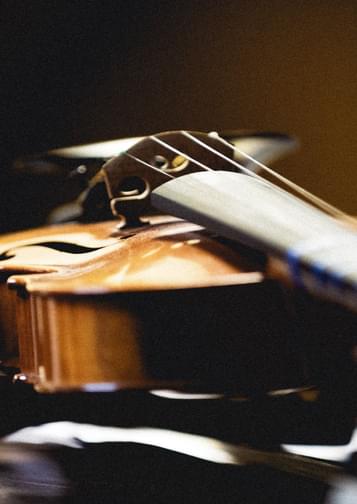 A close-up photograph of a violin.