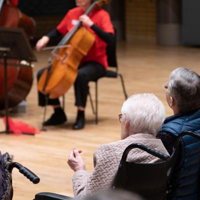 CBSO Cuppa Concert with elderly couple in wheelchairs