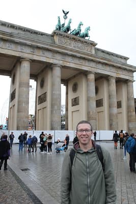Scott in front of Brandenburg Gate in Berlin.