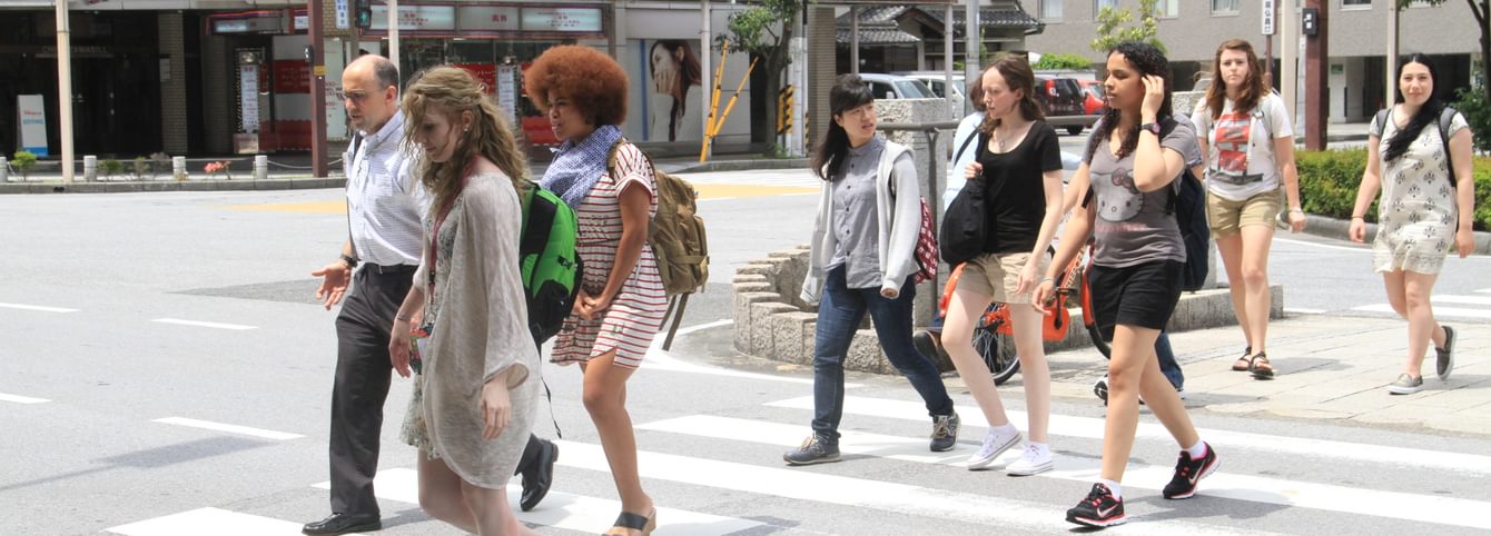 A CLS cohort crosses a street in Taiwan.