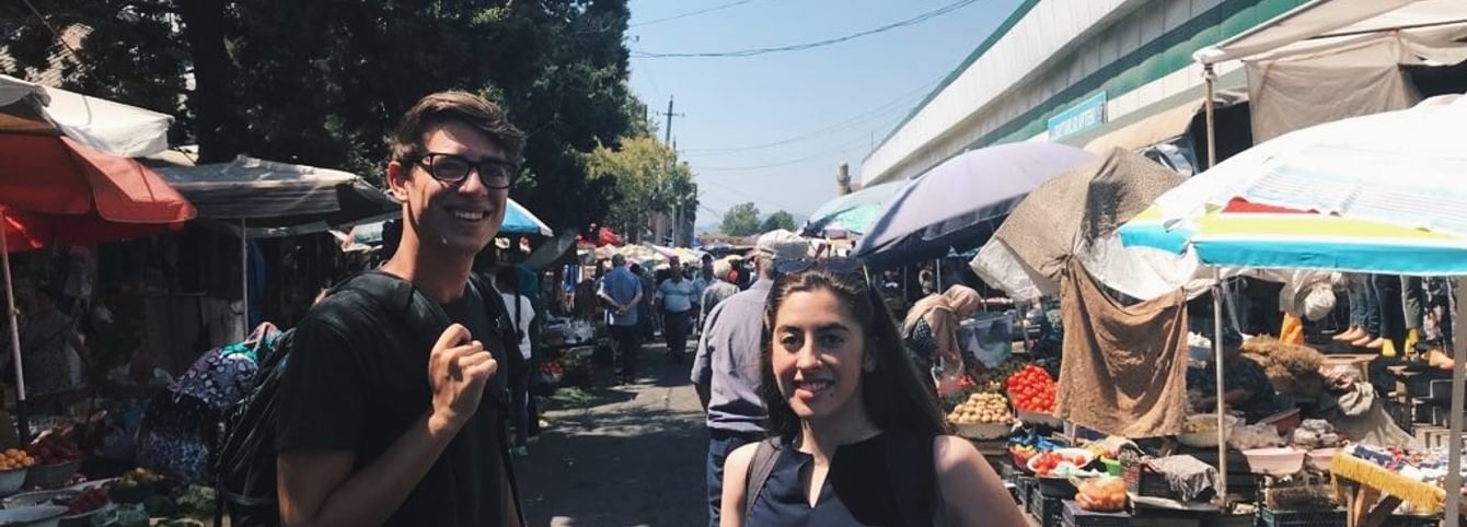 CLS Turkish participant Zoe Kemprecos and I stand with our Advanced Turkish Grammar teacher Ibrahim Yildirim inside the Azerbaijan University of Languages.