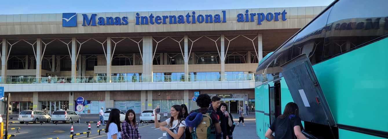CLS students gather in front of Manas International Airport in Bishkek.