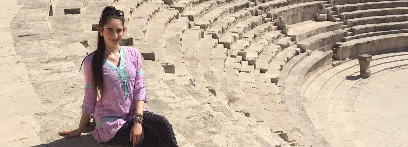 Learning about history and architecture at Amman's Roman Theater.