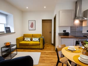 Oak Wood Apartment | Spacious Living Area