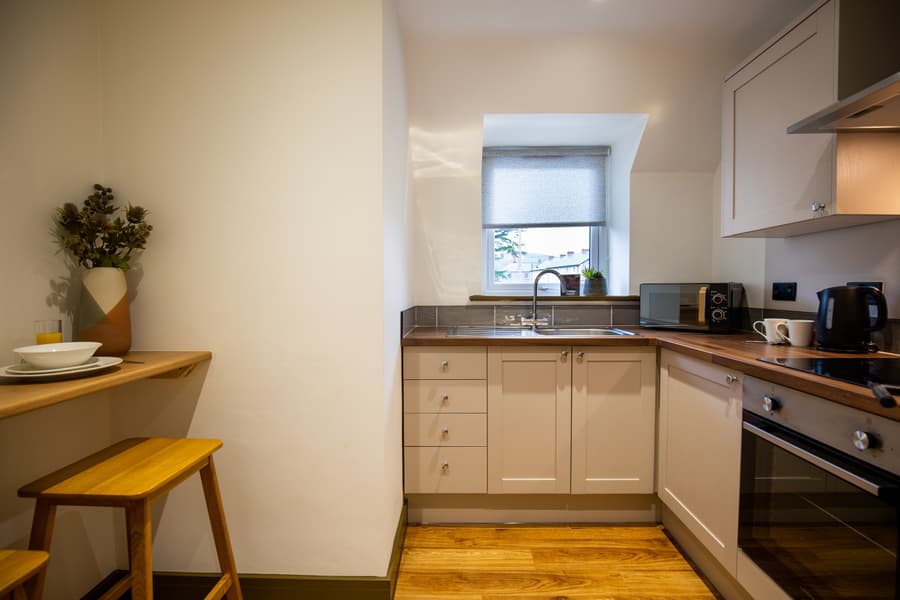 Kitchen and breakfast bar in our holiday cottage