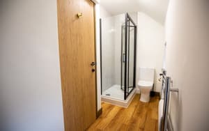 Hazel Apartment | Modern Bathroom With Walk In Shower