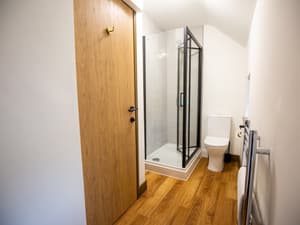 Hazel Apartment | Modern Bathroom With Walk In Shower