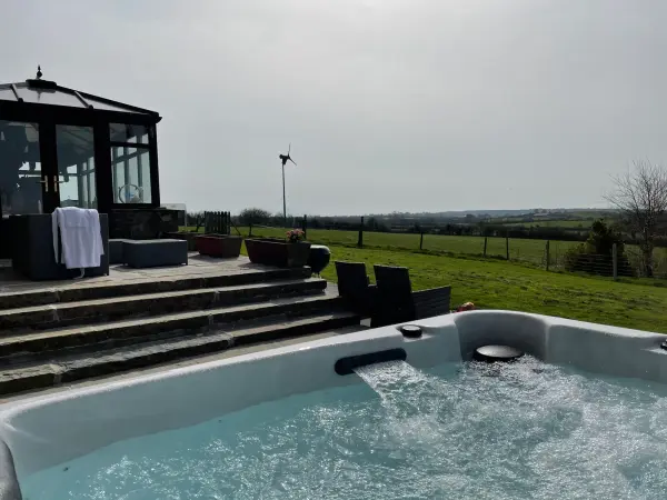 Private patio with luxury hot tub