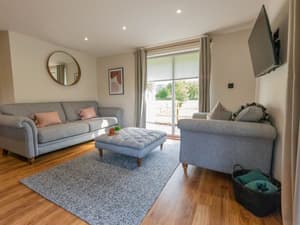 Riverview Cottage | Spacious living area at our holiday lodge in North Wales