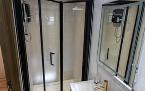 Elder Cottage | Modern Bathroom With Walk In Shower