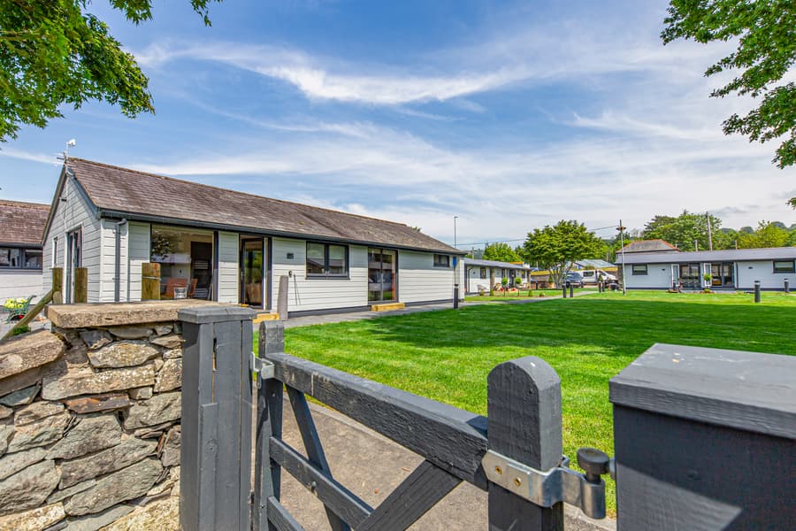 View of Rwst holiday cottages from the riverside