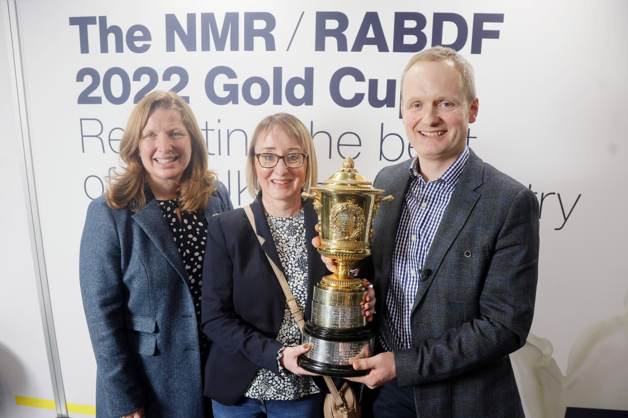 NMR RABDF GOLD CUP WINNER 2022 L to R RABDF Chairman Di Wastenage presents the Gold Cup to Anne and Alistair Logan 2 Copy