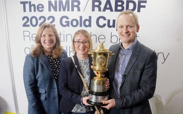 NMR RABDF GOLD CUP WINNER 2022 L to R RABDF Chairman Di Wastenage presents the Gold Cup to Anne and Alistair Logan 2 Copy