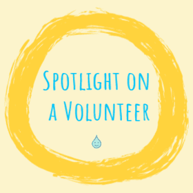 Spotlight on a volunteer banner