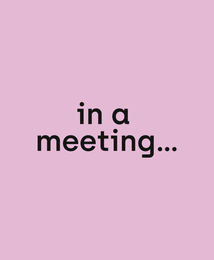 Text: "In a meeting" on pink background