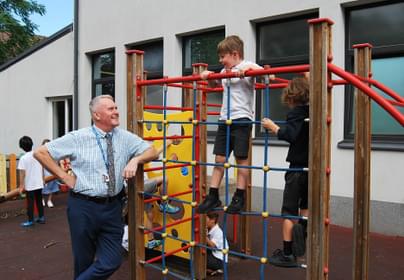 Principal Matthew Cox at BISL School Playground