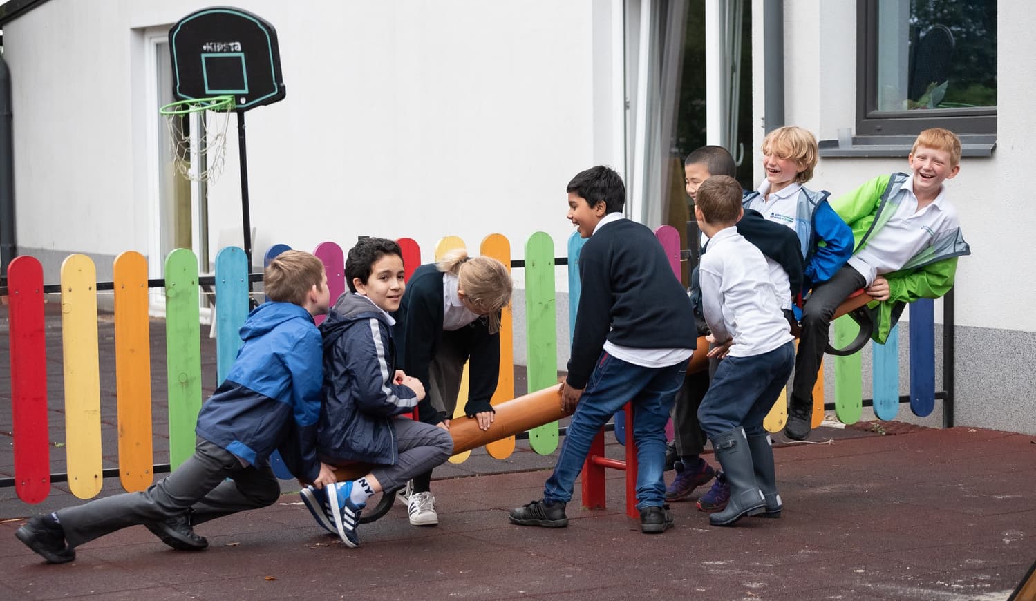 Students playing on playground in school