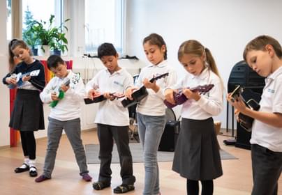 Students playing instruments in school