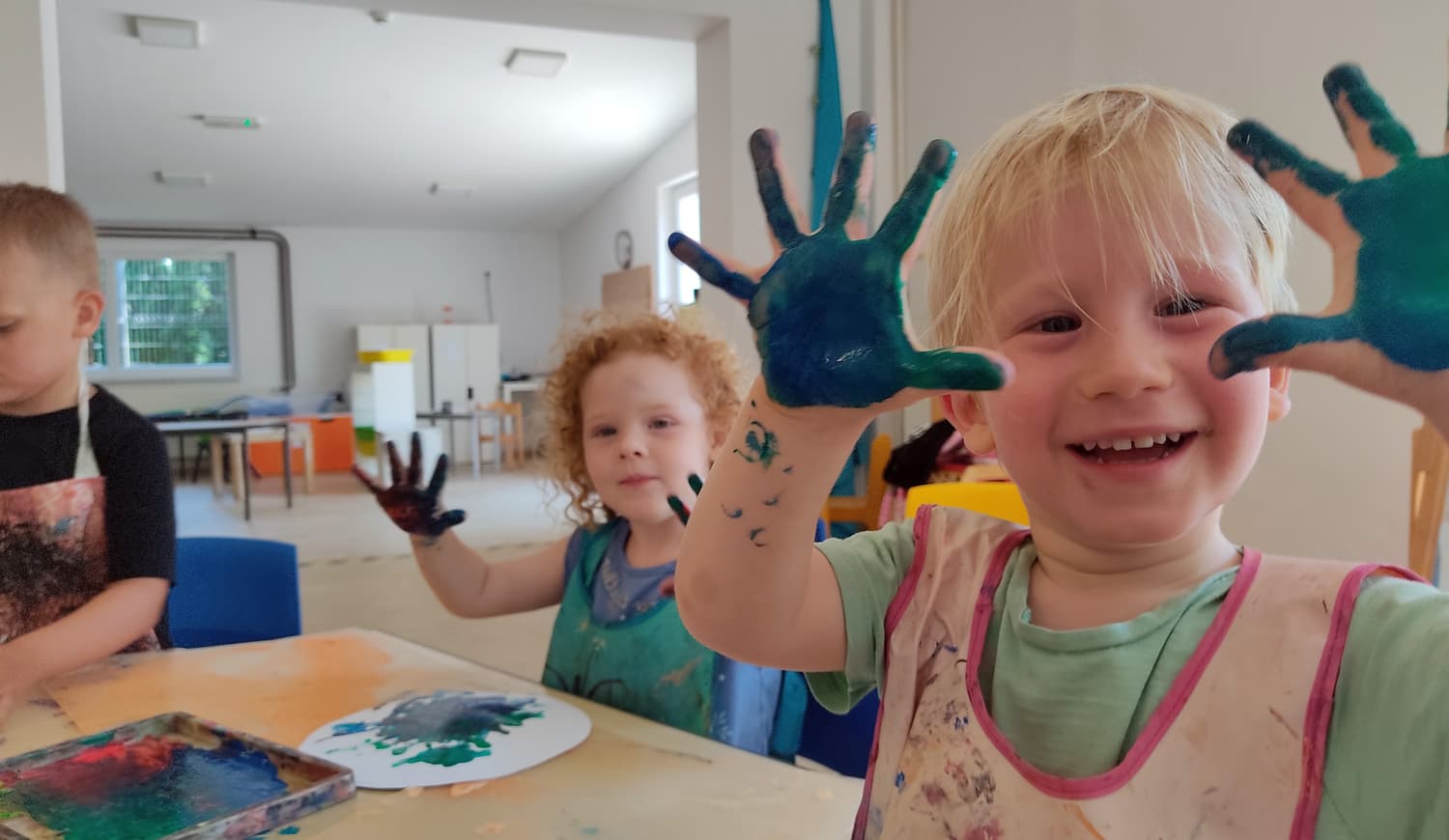 Children playing with hand painting