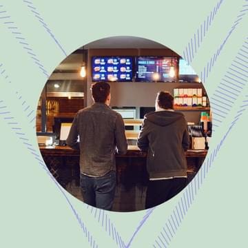 Two men ordering take out food