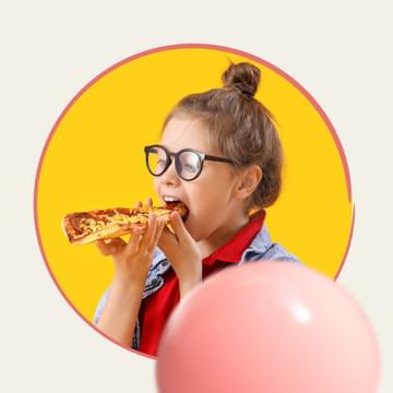 Girl tasting a pizza slice