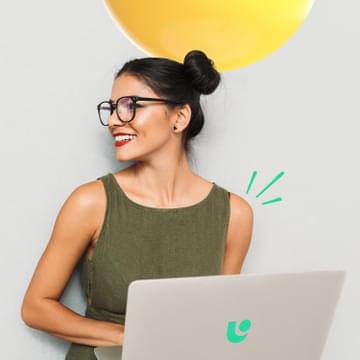 Woman smiling on laptop