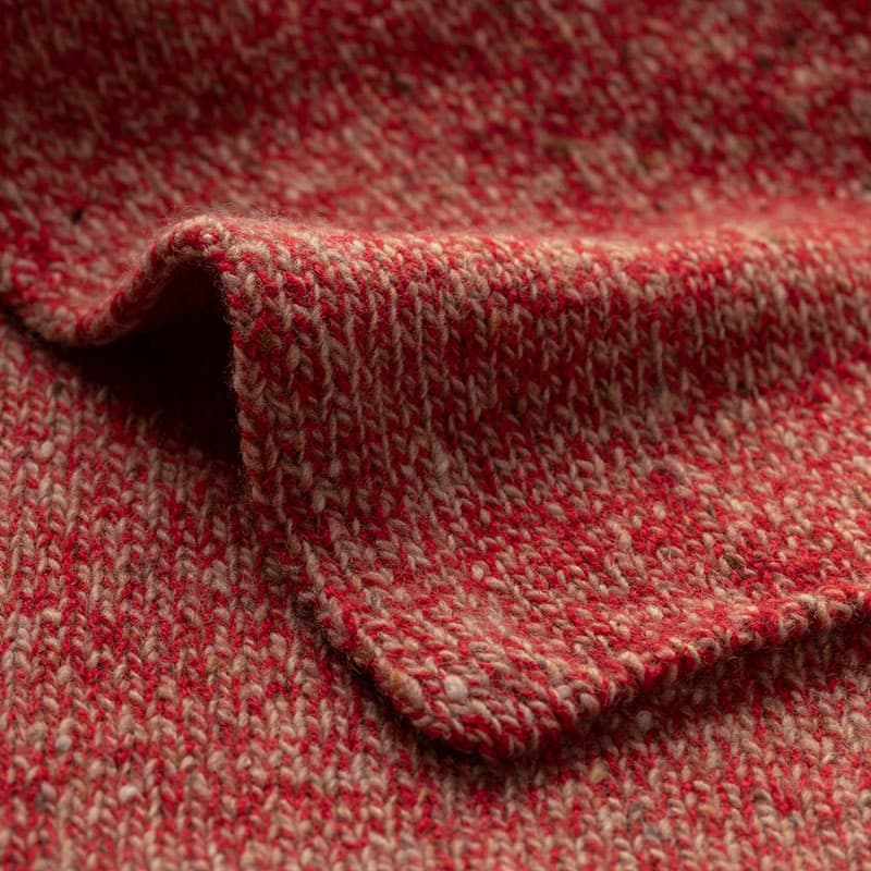 Close up of a Johnstons of Elgin Knitted Cashmere Orkney Red Marl Scarf