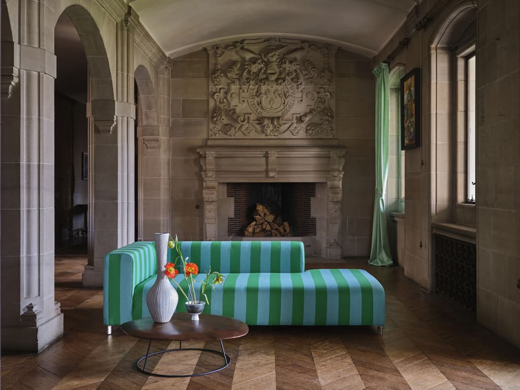 Ben Pentreath and Johnstons of Elgin's green and blue striped fabric covering sofa in private estate Ardkinglas