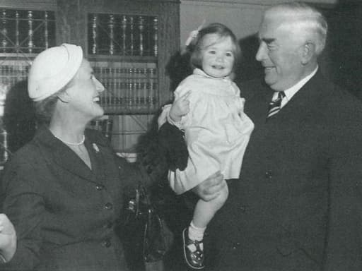 Dame Pattie and Sir Robert with their granddaughter Edwina who returned the scarf to Johnstons