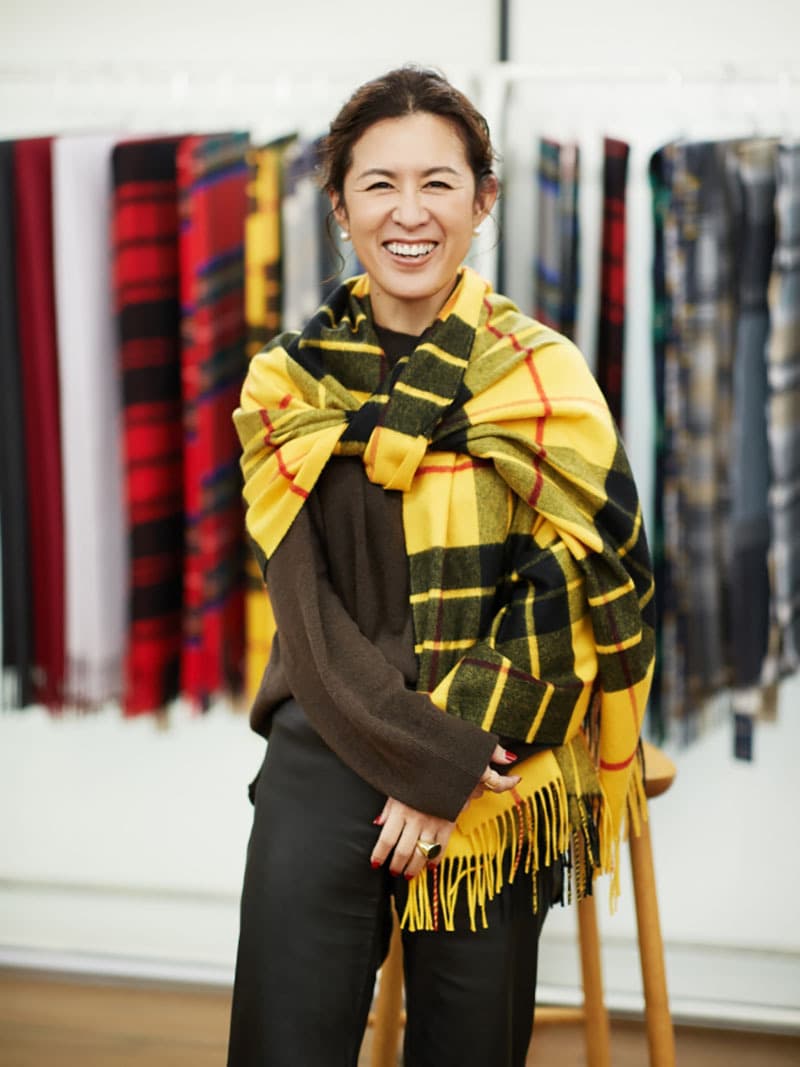 Influential Stylist Naoko Okusa wearing Johnstons of Elgin's MacLeod of Lewis Yellow Tartan Cashmere Stole