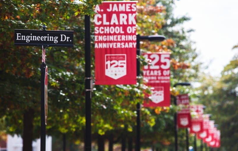 Photo of Engineering Dr. Street Sign and 125th Anniversary Banner for A. James Clark School of Engineering