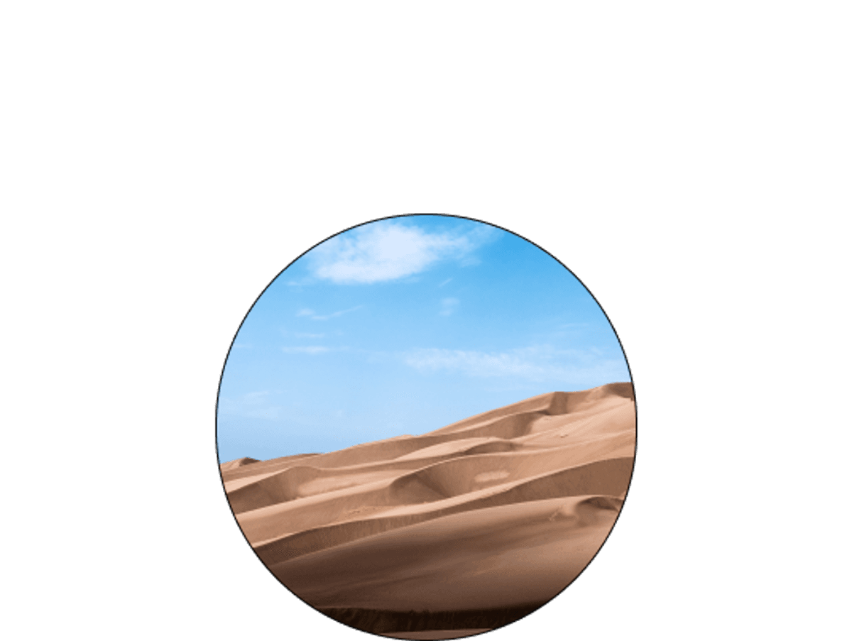 Sand dunes and blue sky.