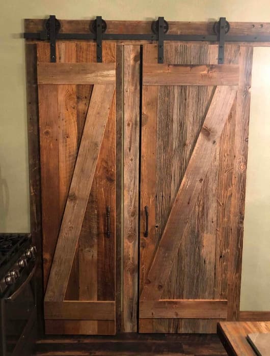 Reclaimed barn wood doors with original surface pine.