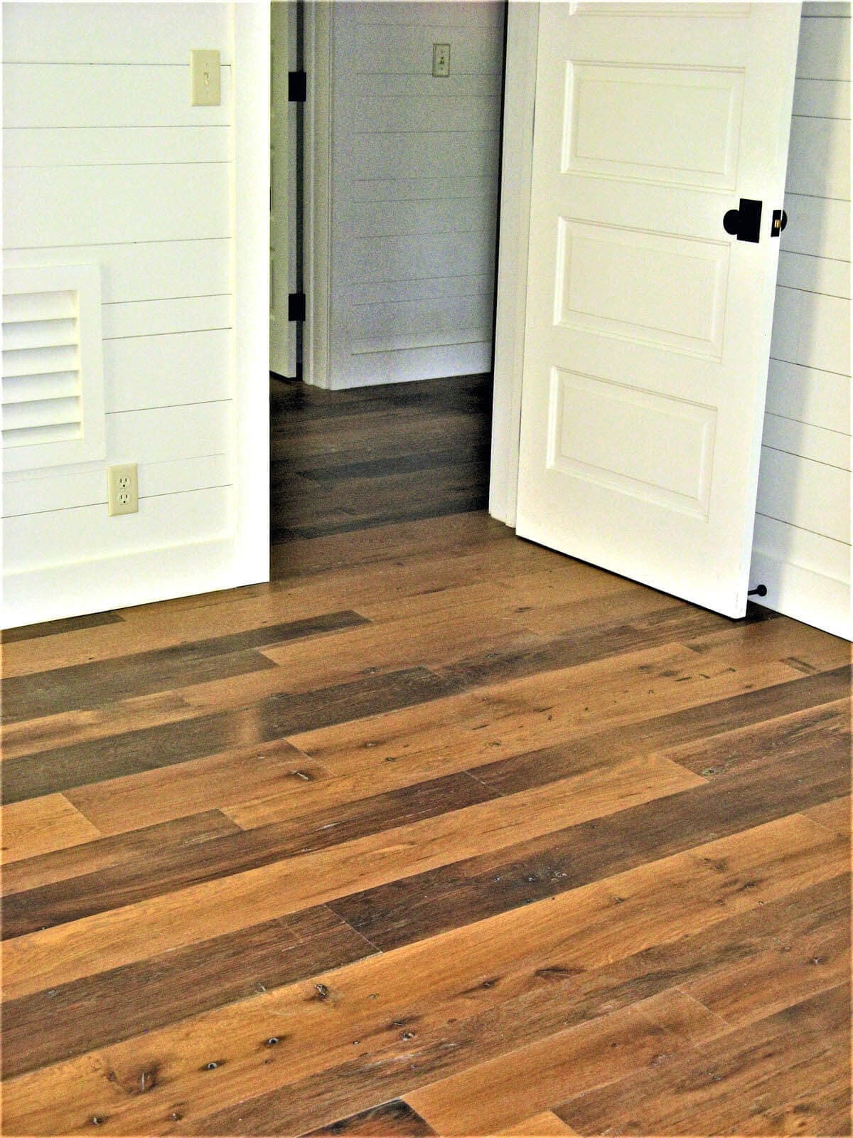 antique white oak flooring by a door near lake toxaway, nc